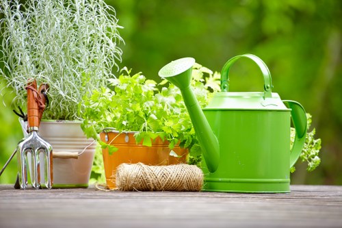 Professional gardeners in Newington shaping hedges and seasonal plants